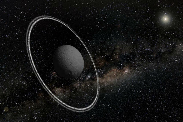 Харикло – первое космическое тело такого размера, которое обладает кольцами. Сегодня этот астероид располагается за орбитой Сатурна, однако, скорее всего, он образовался дальше от Солнца, а затем был втянут ближе к центру системы (иллюстрация Lucie Maquet).