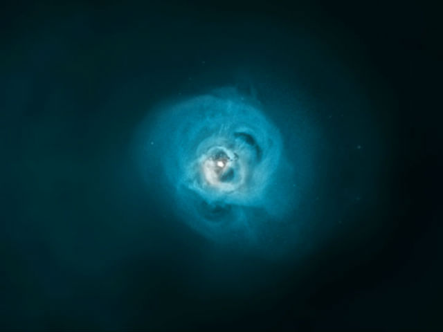 Комбинированный снимок телескопов "Чандра" и XMM-Newton скопления галактик Персея (фото NASA/CXC/SAO/E.Bulbul). 